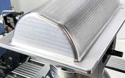 doosan 5-axis productivity revs up motorcycle parts business